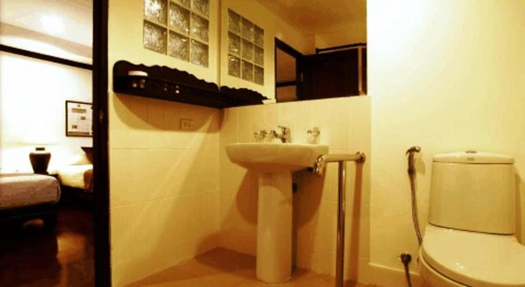 Cucumber Inn Suite Pattaya Quarto foto